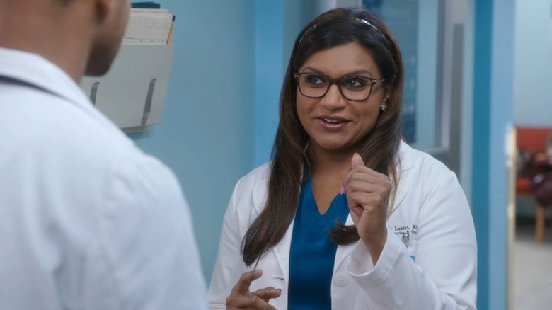 Mindy Lahiri (Mindy Kaling) speaks to a colleague in a hospital in The Mindy Project