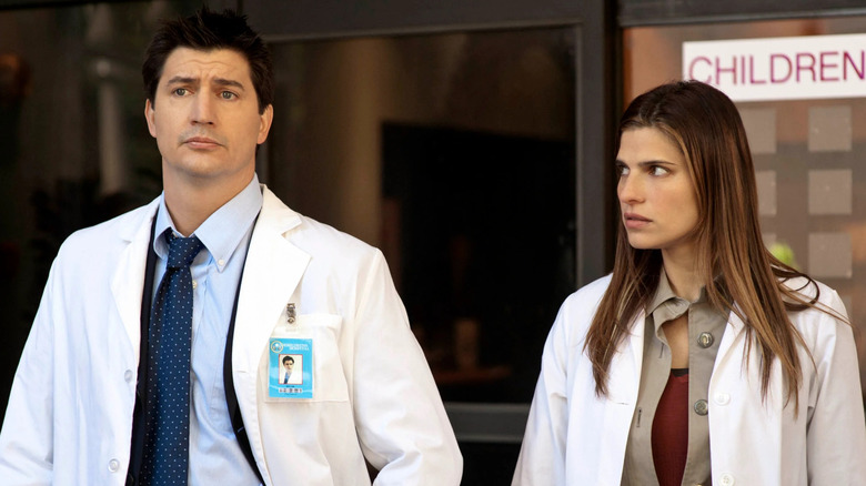 Ken Marino as Dr. Glenn and Lake Bell as Dr. Cat standing outside in Childrens Hospital