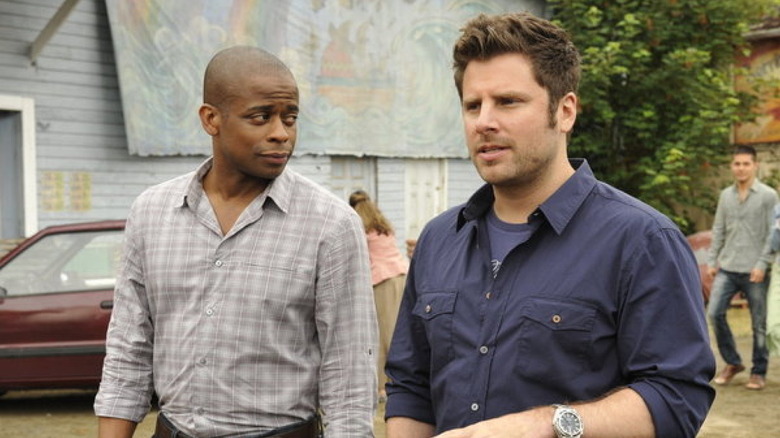 Dulé Hill and James Roday as Gus and Shawn standing outside in Psych