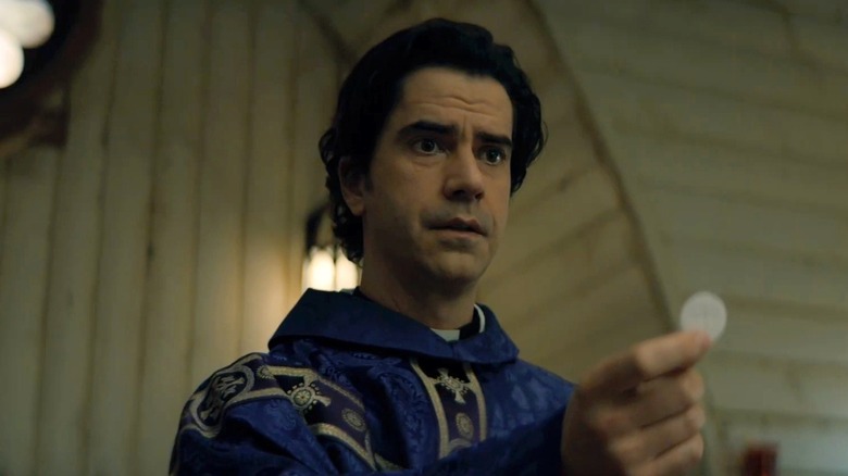 Hamish Linklater as Father Paul Hill conducts a Catholic Mass in Midnight Mass