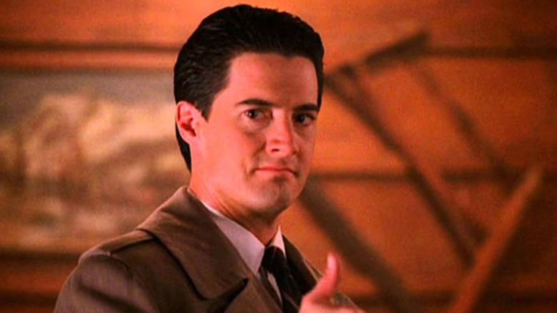 Kyle MacLachlan as Dale Cooper gives a thumbs up on Twin Peaks
