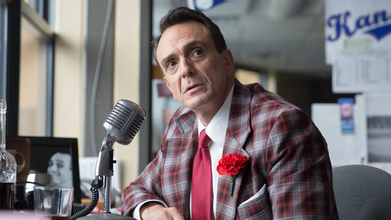 Jim Brockmire (Hank Azaria) looks up from a microphone in Brockmire