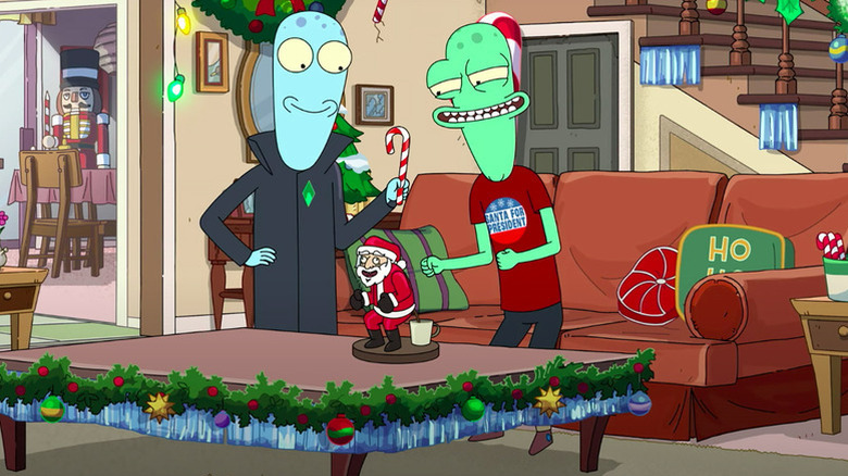 Korvo (Justin Roiland) and Terry (Thomas Middleditch) smile over Christmas decorations in the living room in Solar Opposites