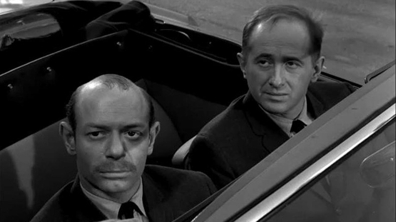 An alien (Milton Selzer) and his companion (Larry Breitman) look impassively from a convertible in "The Twilight Zone."