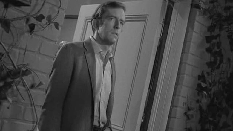 Will Sturka (Fritz Weaver) stands off-balanced in a doorway in "The Twilight Zone."