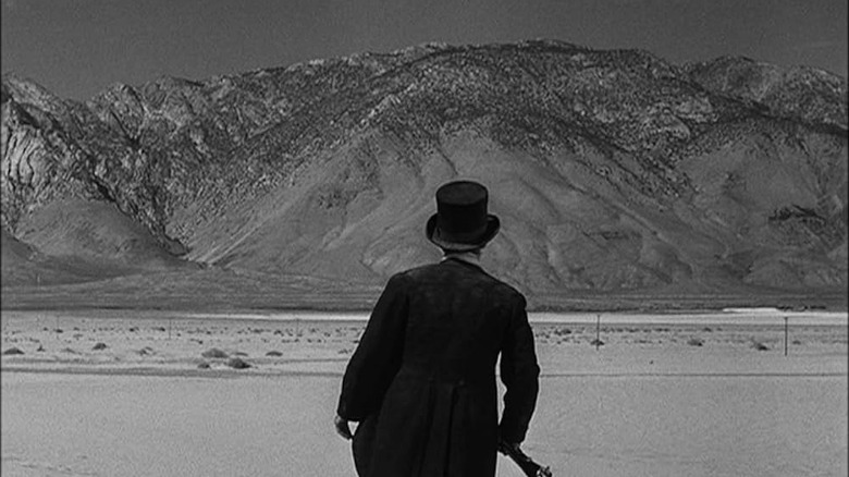 Chris Horn (Cliff Robertson) surveys a modern highway in The Twilight Zone (1959)