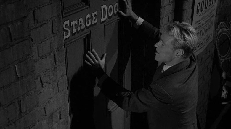 Peter Corrigan (Russell Johnson) tries to get into a stage door in The Twilight Zone (1959)