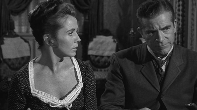 Abigail Sloan (Patricia Breslin) glances at Paul Driscoll (Dana Andrews) in The Twilight Zone (1959)