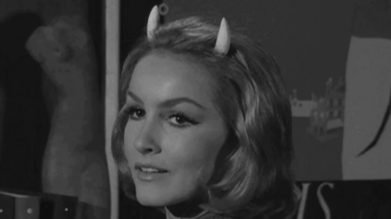 Miss Devlin (Julie Newmar) reveals her devil horns in The Twilight Zone (1959)