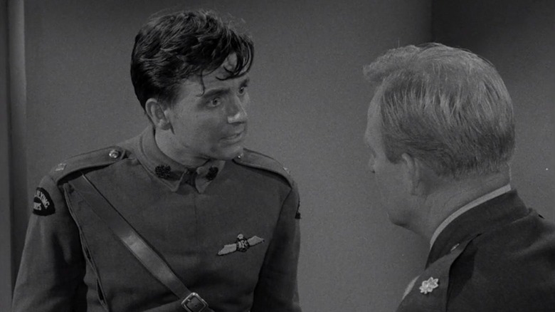 Terry Decker (Kenneth Haigh) speaks to a modern officer in The Twilight Zone (1959)