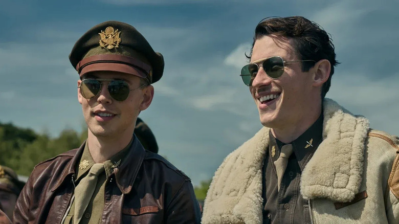 Major Gale Cleven laughs next to Major John Egan