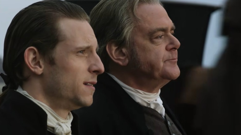 Abraham Woodhull stands next to Richard Woodhull, both looking on