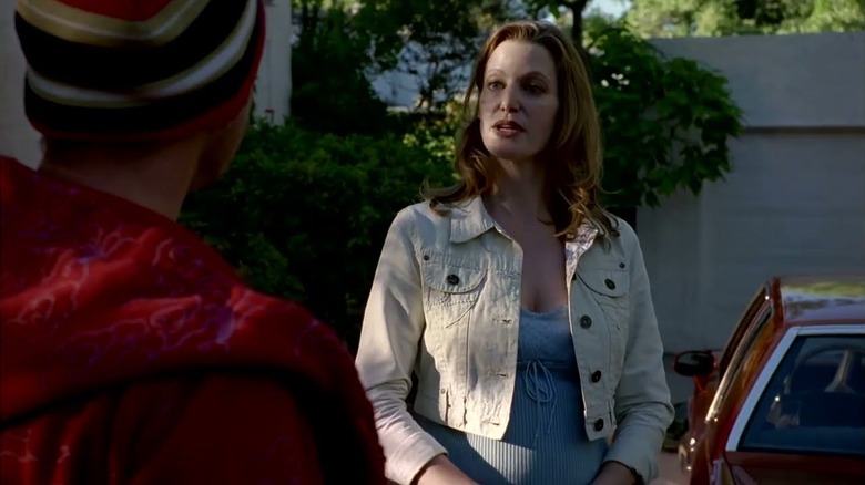 Anna Gunn as Skyler White talking to Aaron Paul as Jesse outside in Breaking Bad