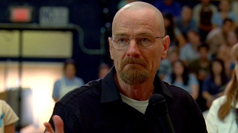 Bryan Cranston as Walter White speaking at an assembly on Breaking Bad