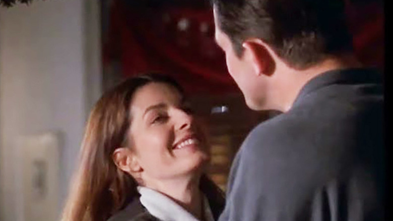 Sela Ward as Lily smiling at man with face not visible in Once and Again