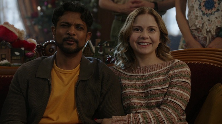 Jay and Sam sitting on an ornate couch