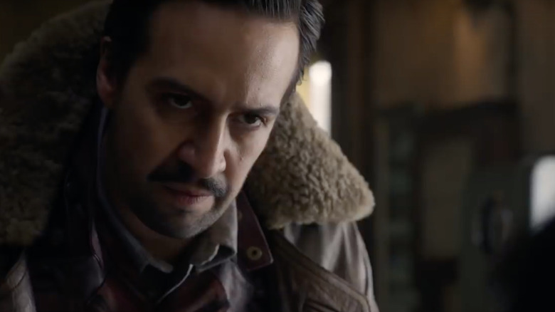 Lee Scoresby looking up and scowling