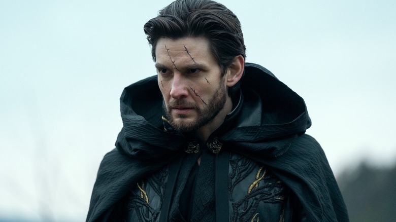 A scarred General Aleksander Kirigan (Ben Barnes) grimaces in Shadow and Bone