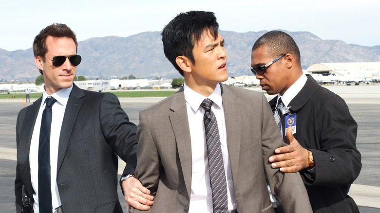 Demetri (John Cho) being led away on "FlashForward."