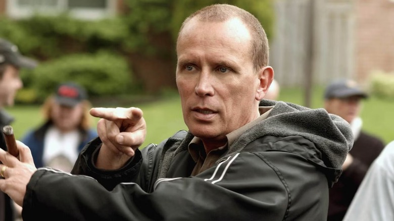 Chuck (Peter Wellers) pointing his fingers on "Odyssey 5."