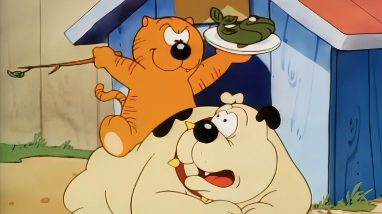 Heathcliff sits on a dog in Heathcliff