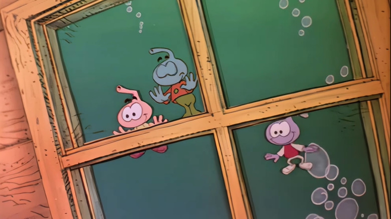 A bunch of Snorks look into a window in Snorks