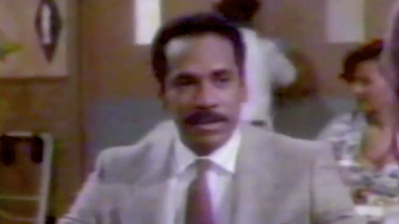 Frank Parrish (Tim Reid) takes a dinner meeting in Frank's Place