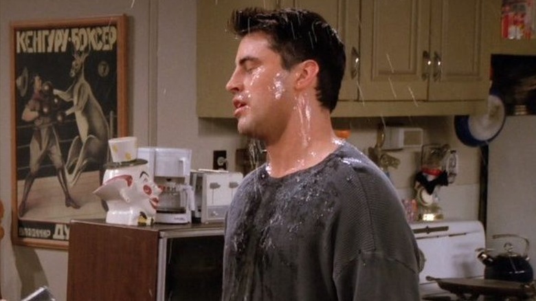 Joey having water thrown in his face in Friends