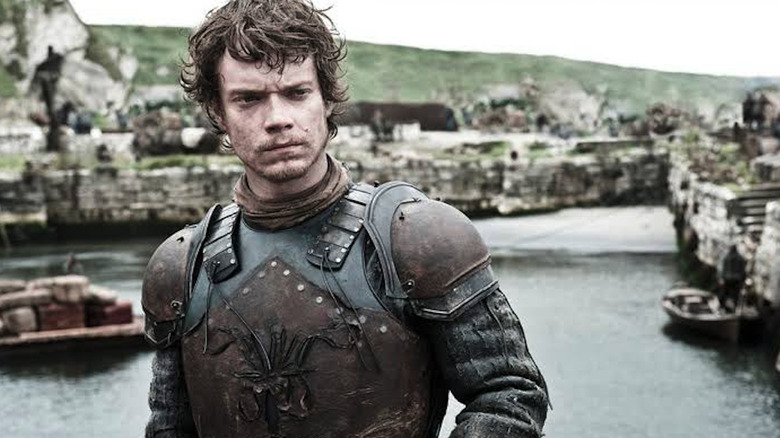 Alfie Allen as Theon Greyjoy looks concerned on Game of Thrones