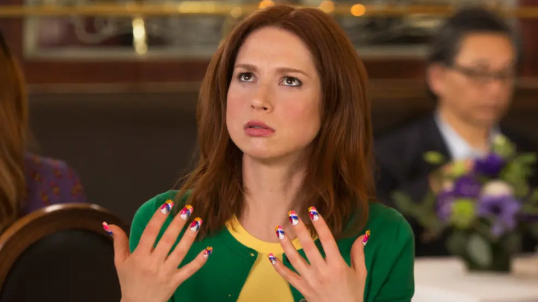 Kimmy Schmidt (Ellie Kemper) shows off her painted fingernails in Unbreakable Kimmy Schmidt