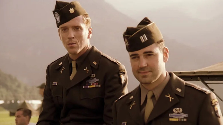 Dick Winters (Damian Lewis) and Lewis Nixon (Ron Livingston) sit on Jeep together in Band of Brothers