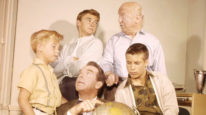 The cast of My Three Sons sitting and standing together