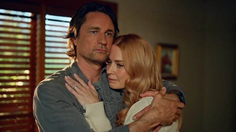 Jack with arms around Mel