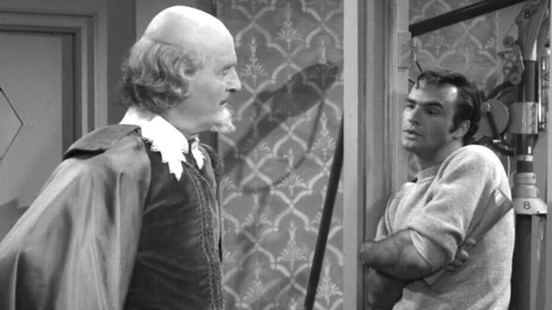 William Shakespeare (John Williams) talks to Rocky Rhodes (Burt Reynolds) in The Twilight Zone