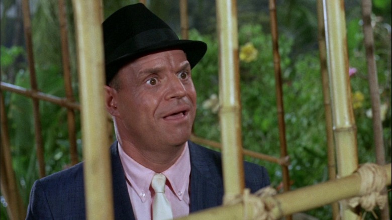 Don Rickles as Norbert, temporarily trapped in a cage on Gilligan's Island