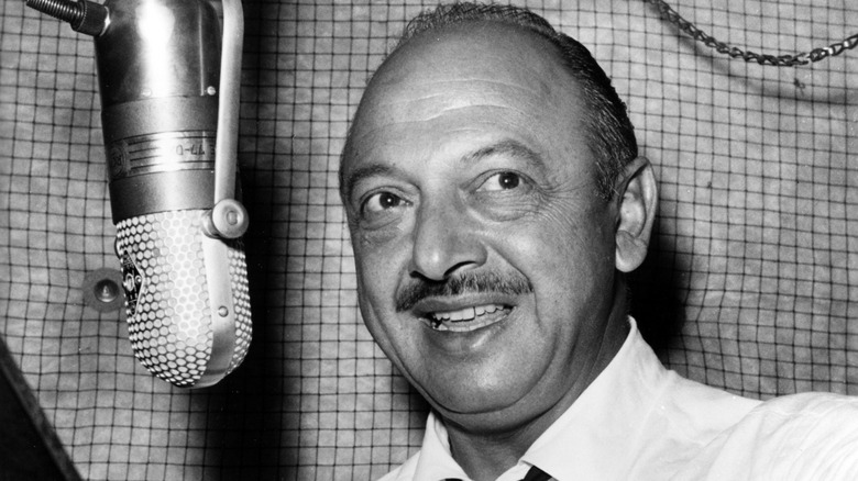 Mel Blanc in a recording booth.