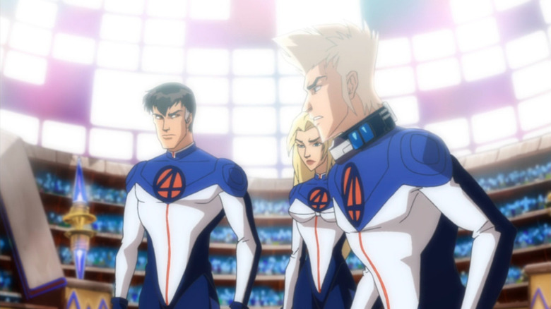 Reed Richards, Sue Storm, and Johnny Storm standing together on "Fantastic Four: World's Greatest Heroes."