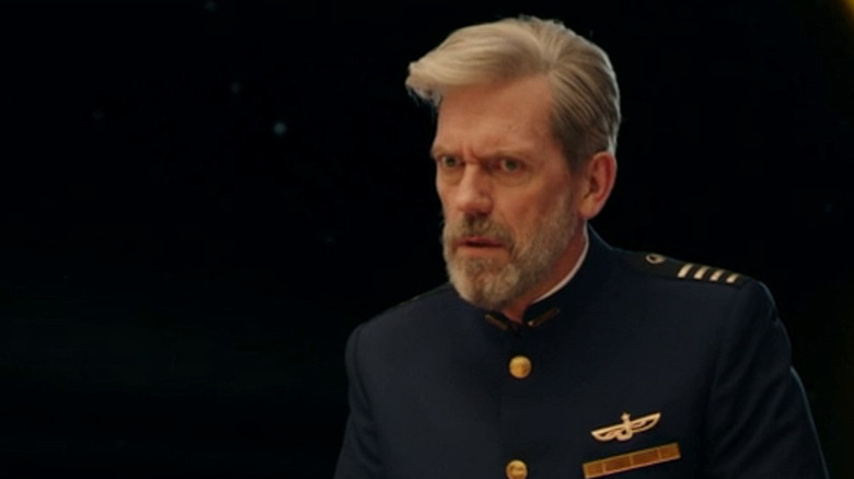 Hugh Laurie as Ryan Clark looking concerned in Avenue 5