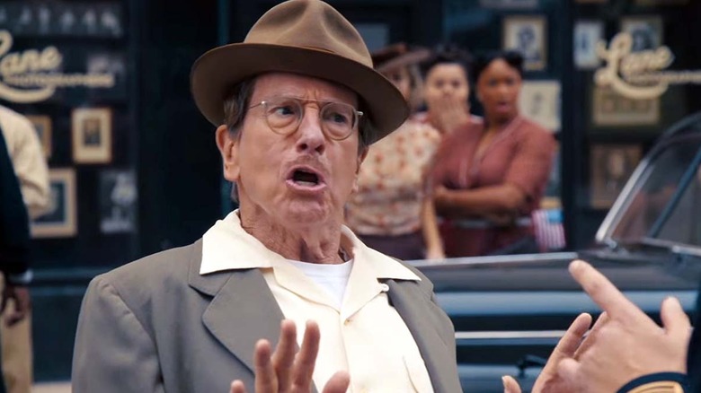 Larry David as a man in the 1940s looking angry in Life, Larry and the Pursuit of Unhappiness