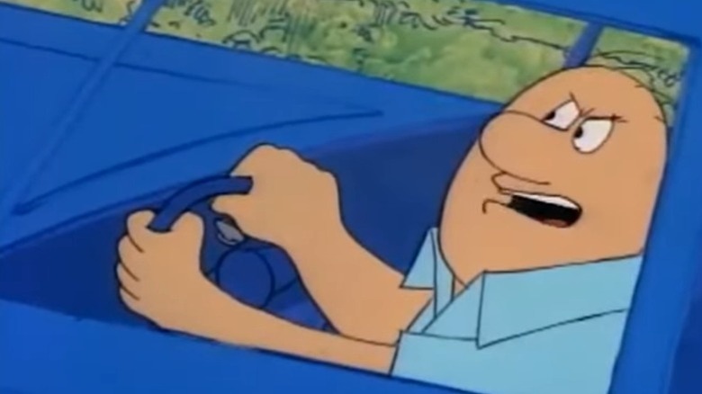 Harry driving his car with an angry expression on Wait Till Your Father Gets Home