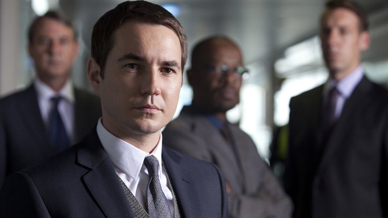 Steve (Martin Compston) surrounded by colleagues on "Line of Duty"