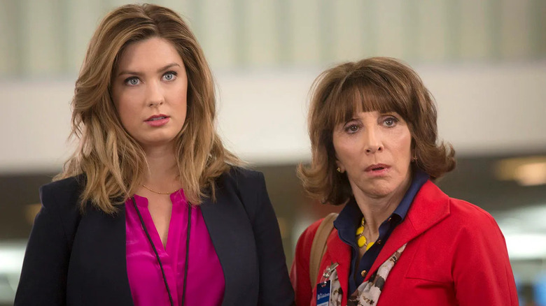Briga Heelan as Katie Wendelson stands next to Andrea Martin as Carol Wenderson on Great News