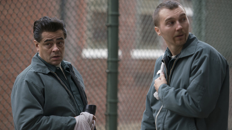 Benicio del Toro as Matt and Paul Dano as Sweat in matching prison uniforms in Escape at Dannemora