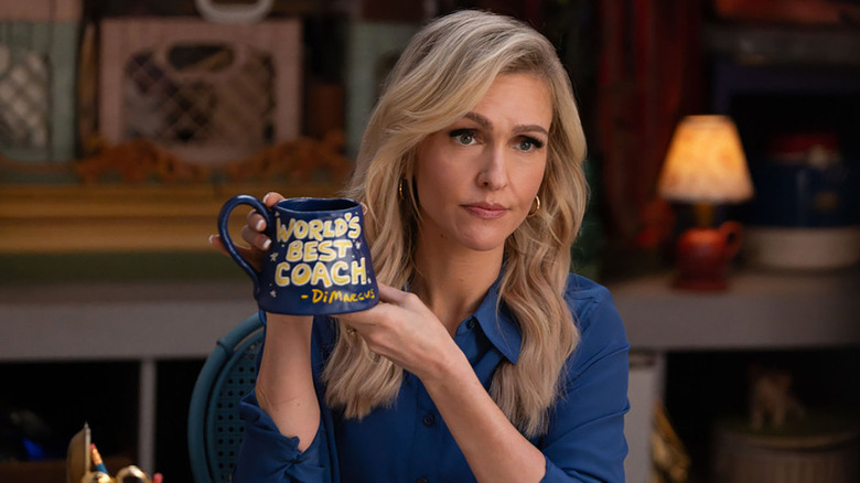 Courteney Potter (Jenn Lyon) holding a mug on "Stumble."