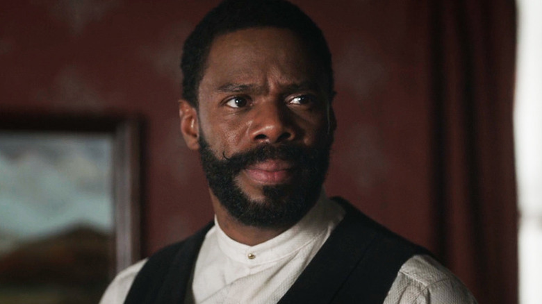 Bass Reeves (Colman Domingo) standing in a room on "Timeless."