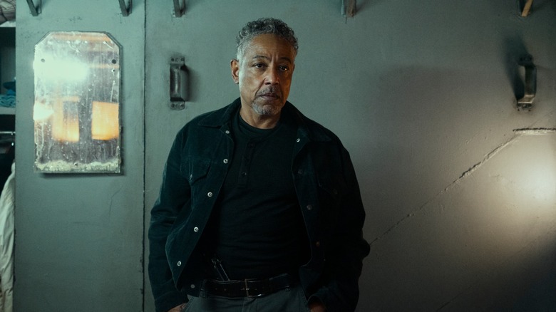 Ray Vernon (aka Leo Pap) looks ahead of him, hands in his pockets, in "Kaleidoscope."