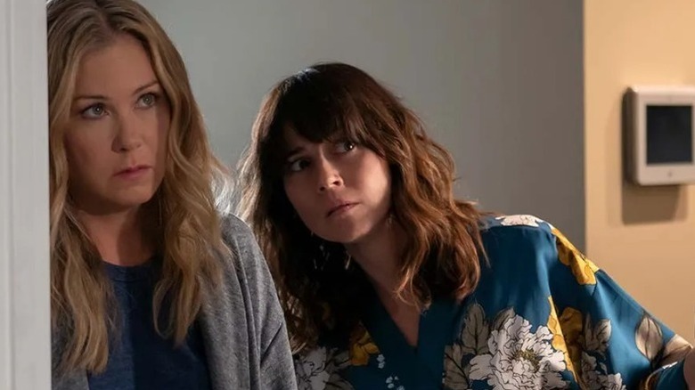 Jen Harding (Christina Applegate) and Judy Hale (Linda Cardellini) stare at something intently in Dead to Me