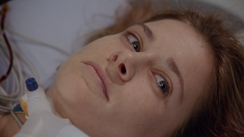Kellie Martin as Lucy Knight with tube in her throat in "ER."