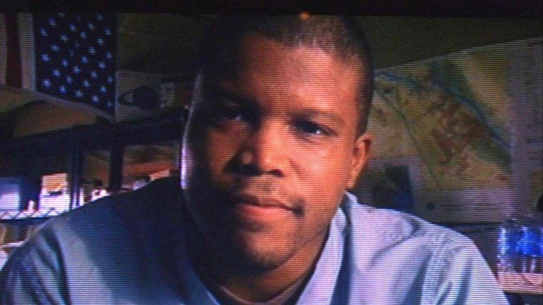 Sharif Atkins as Gallant with American flag behind him in "ER."