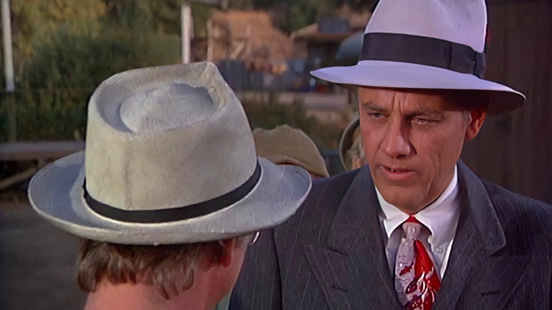 Henry Blake (McLean Stevenson) speaks to John Mulcahy (William Christopher) in M*A*S*H